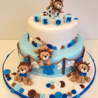 Geburtstagstorte mit kleinen Löwen